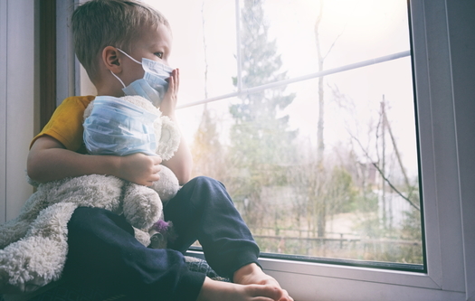 child looking out the window